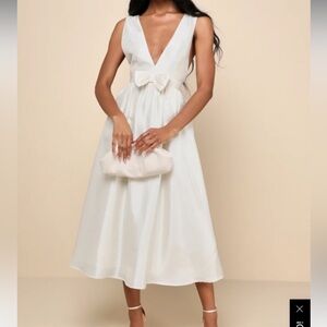 Cream sleeveless bow midi dress